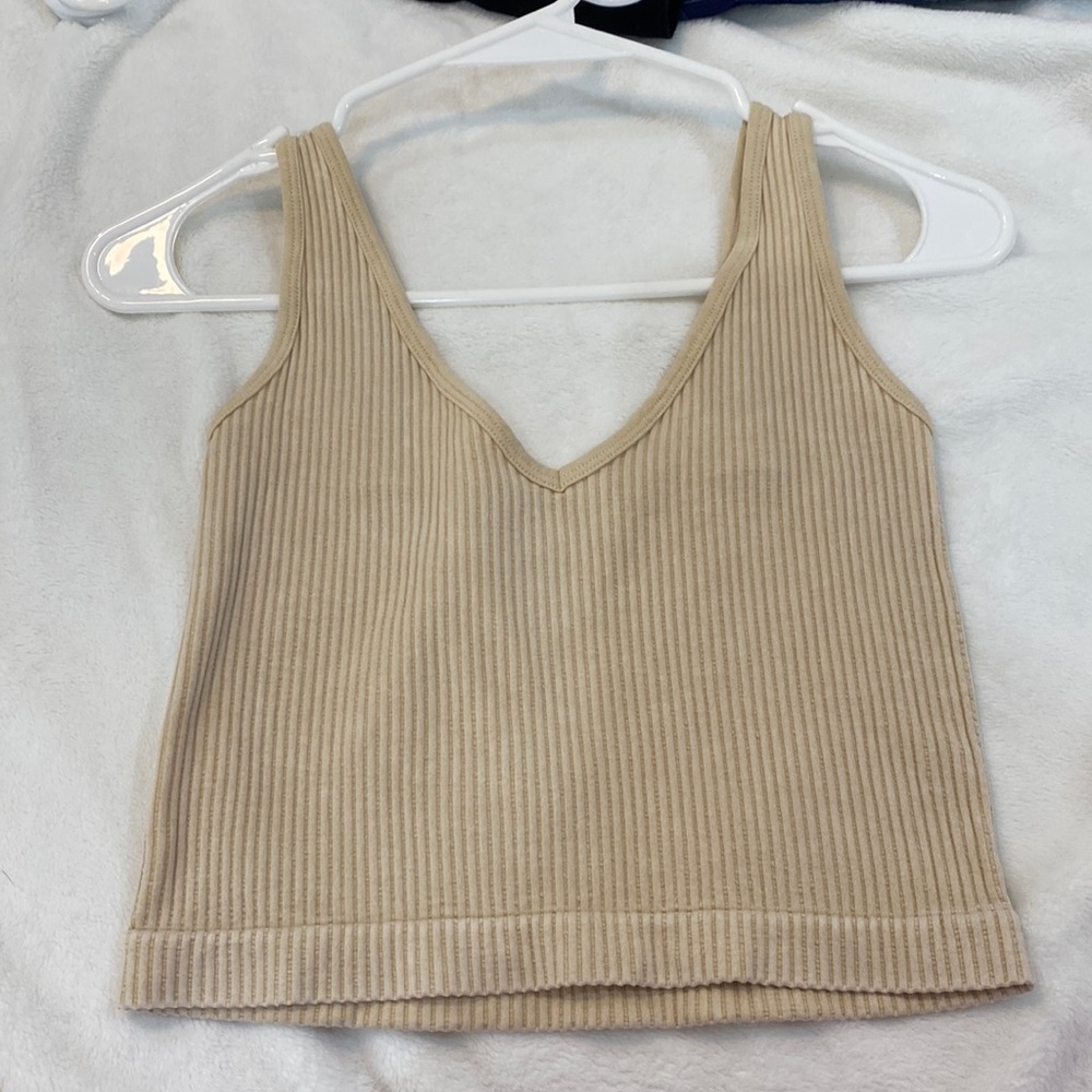 Cream/Beige casual tank top.